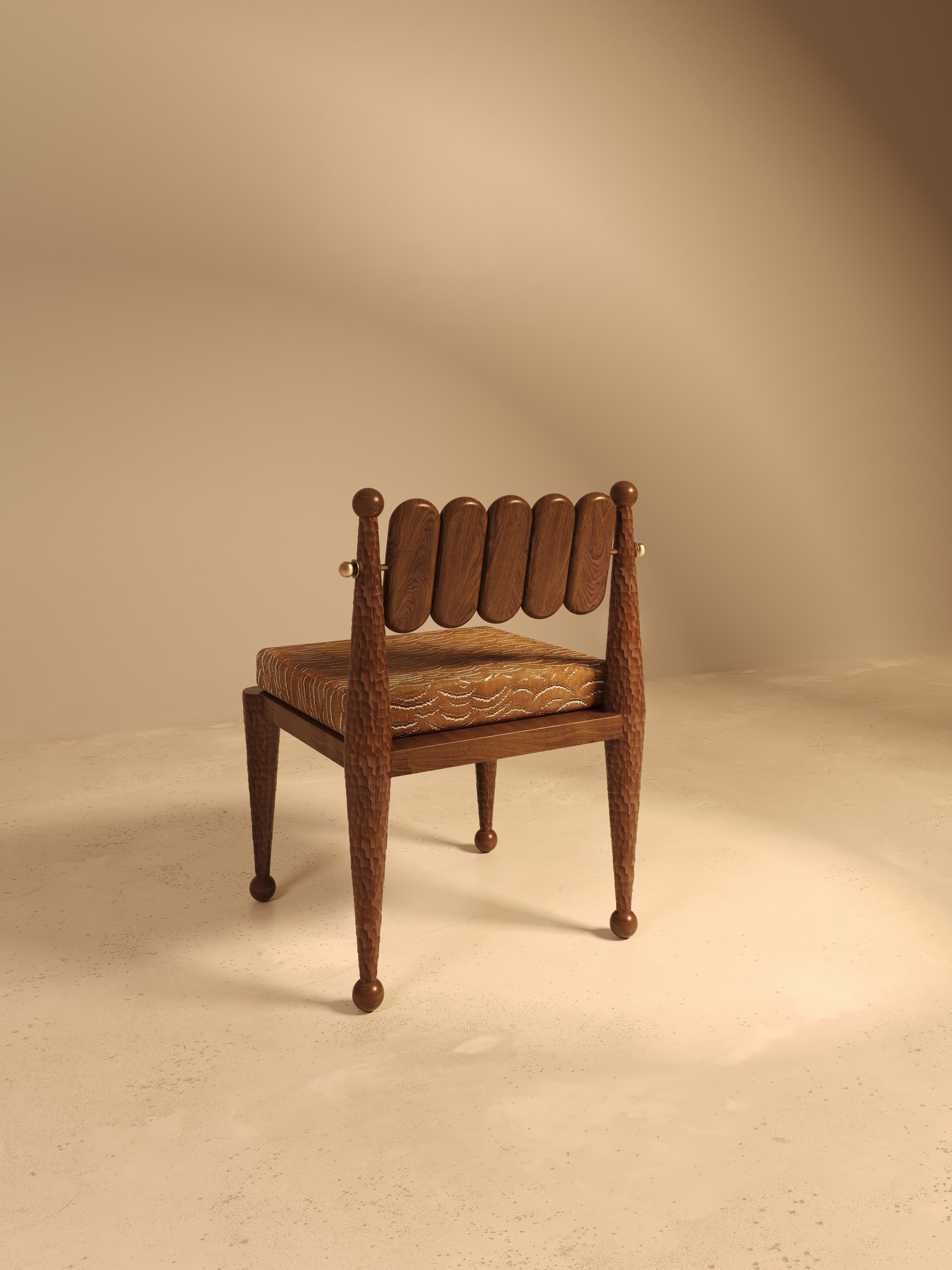 SIMORGH I – Carved Walnut with Pierre Frey Upholstery — side angle