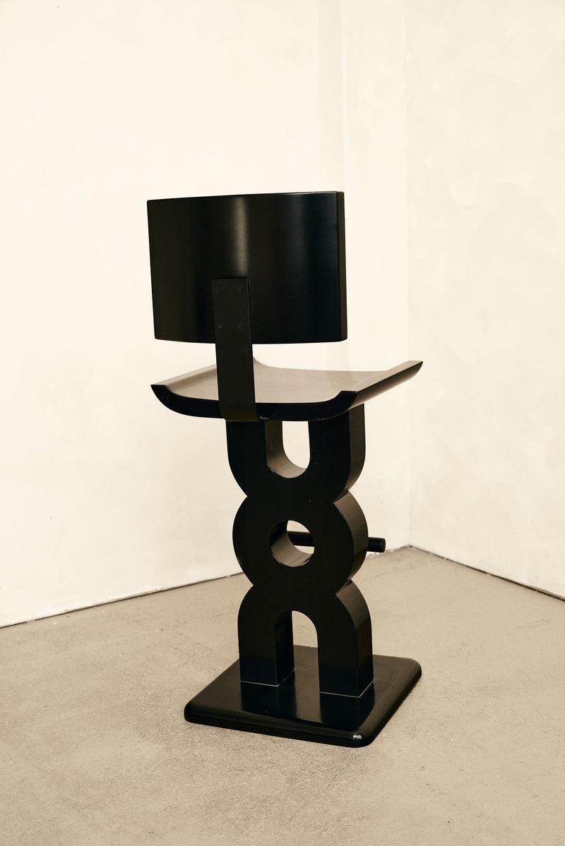 Soro Bar Stool — angled view of black lacquered wood design