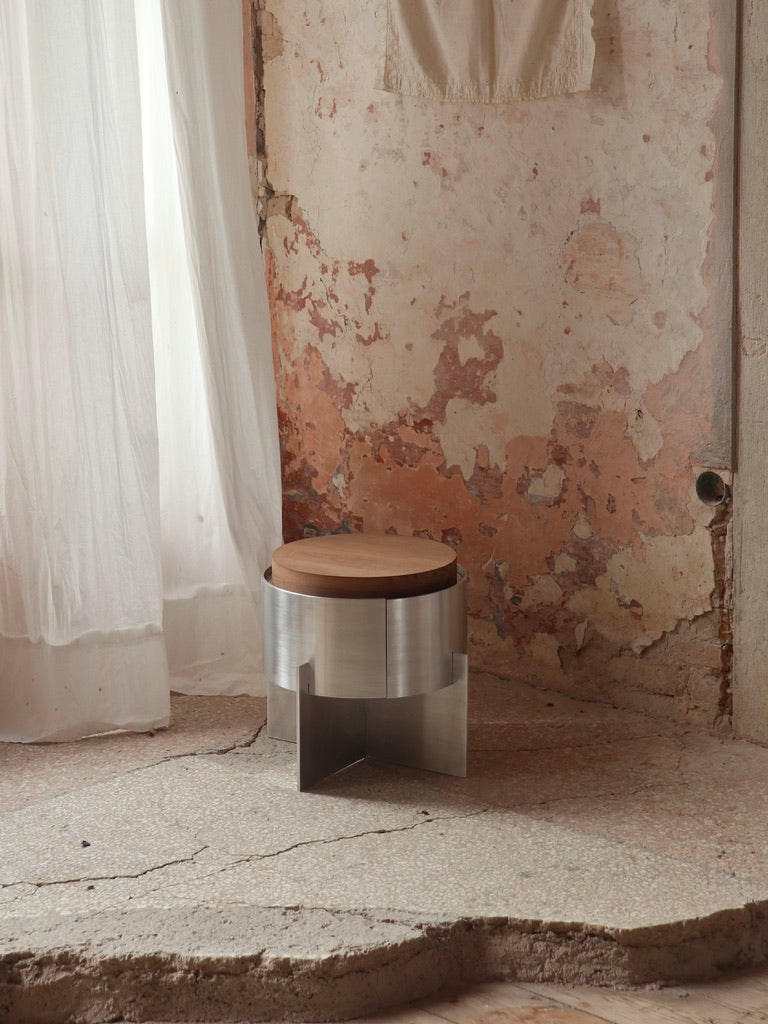 Lunar Side Table — top view of wooden seat and metal base