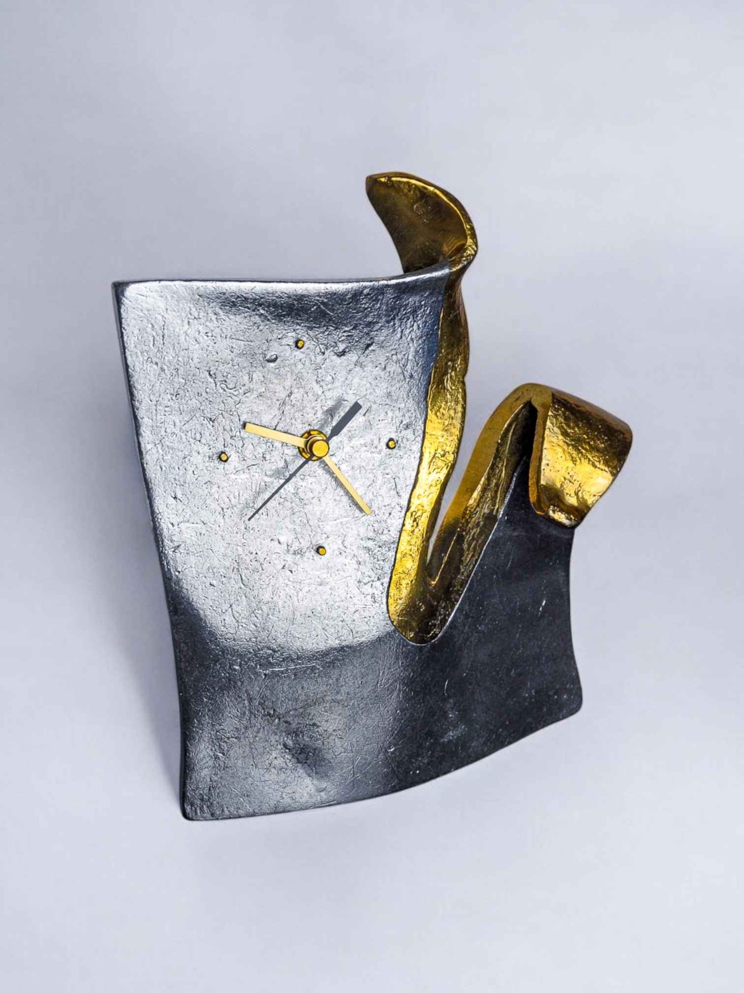 Brutalist clock by Art3, Spain, 1980s — side angle highlighting textured black and gold finish