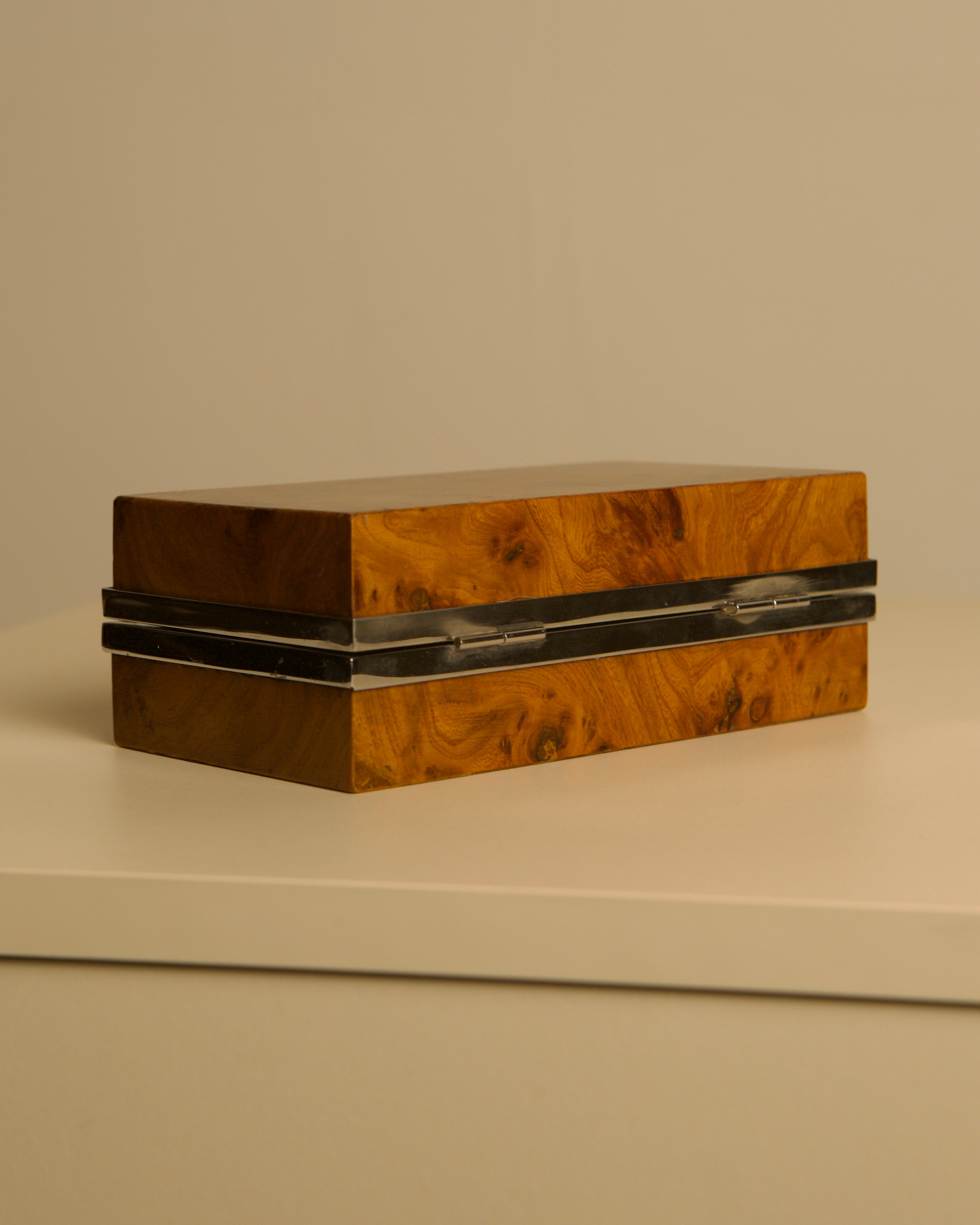 Italian box in elm wood with a metal interior, 1960s — angled view highlighting wood grain and metal detail