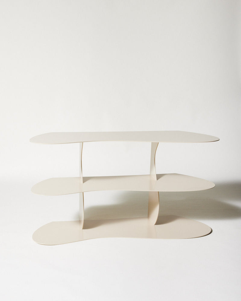 Modern white curved shelf with three oval tiers by Nicole Lawrence