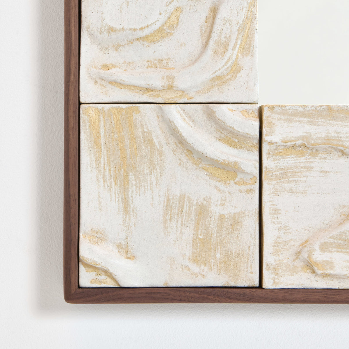 Artisanal ceramic tiled mirror — close-up