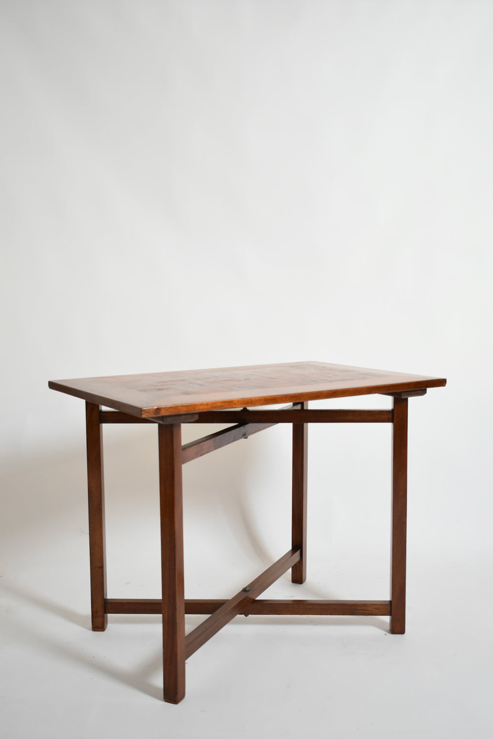 X Shaped Foot Chessboard Table, XIXth c. — angled view on white backdrop