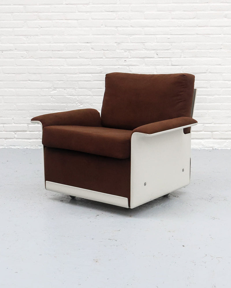 Brown upholstered Dieter Rams 620 armchair with white fiberglass base