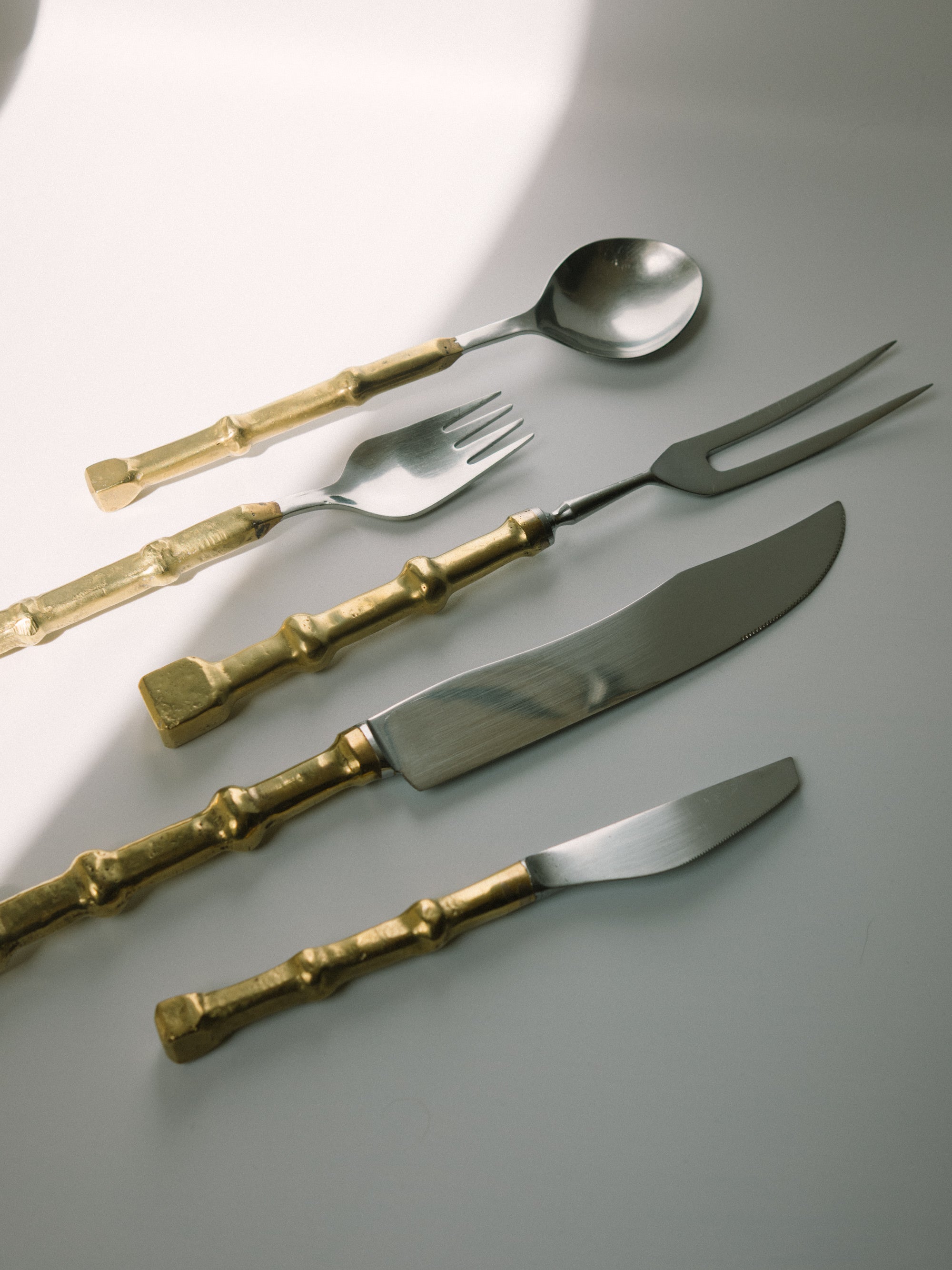 David Marshall Brutalist Brass and Stainless Steel Serveware Set, Spain, c. 1970s — detail view