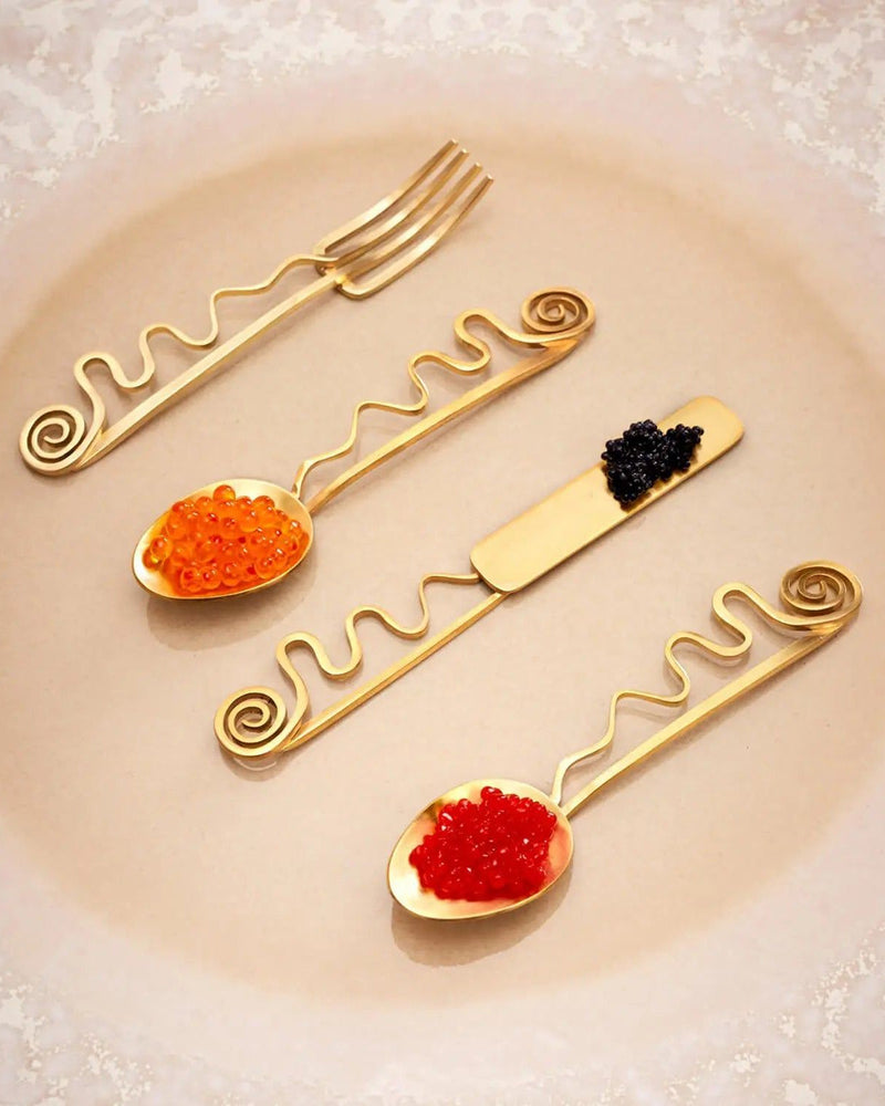 Spirale Serving Set of 2 — close-up of gold serving utensils with caviar
