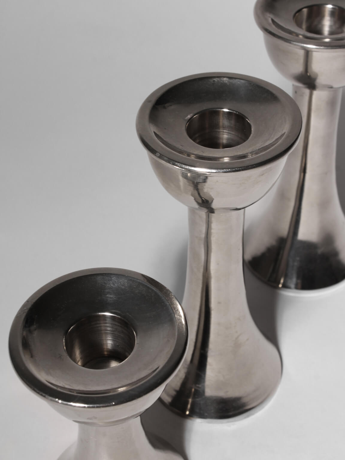 Mid-Century Silver Aluminum Candle Holders Set — side angle
