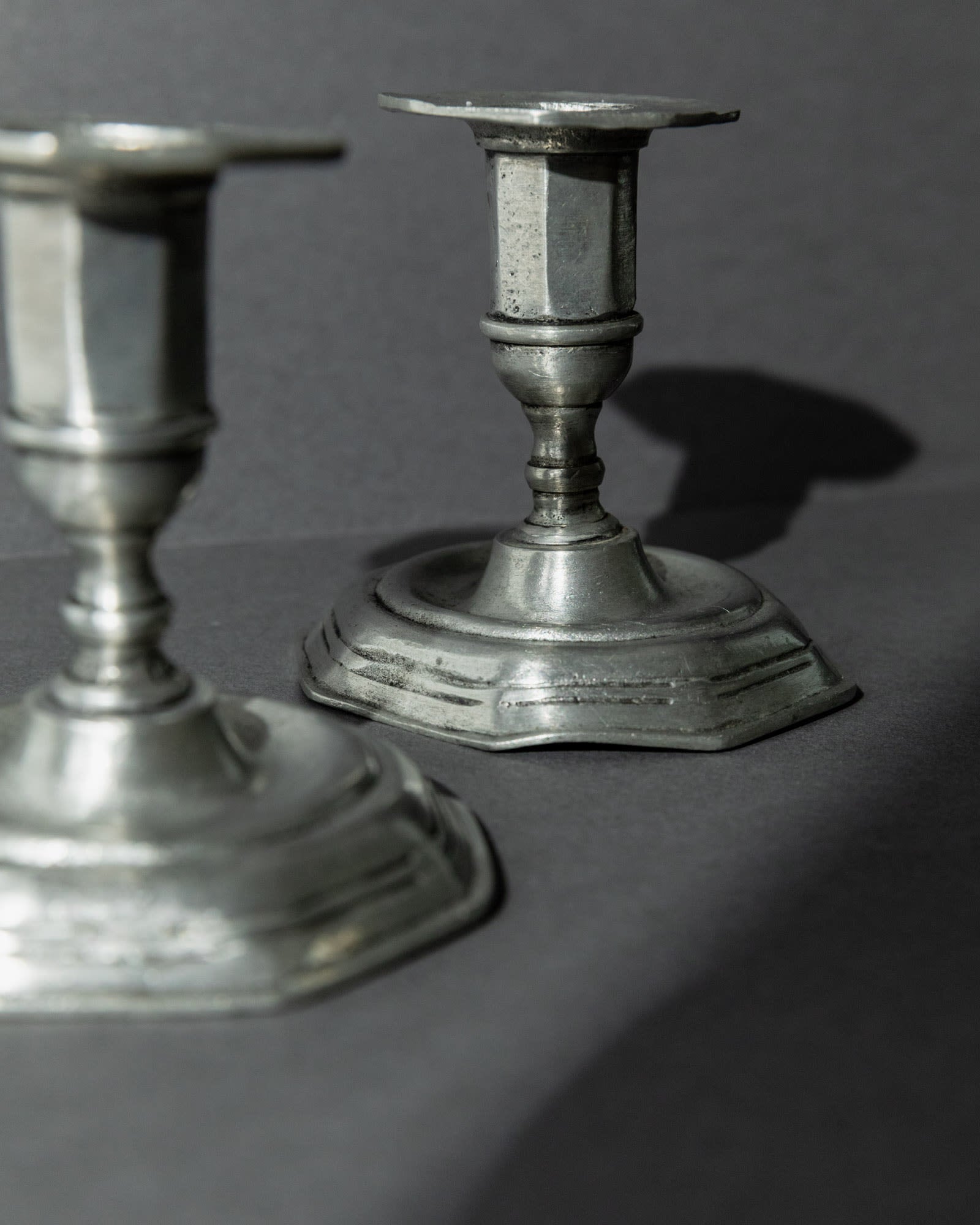 1900s Pewter Candleholders Set of 2 — close-up of pewter texture and details