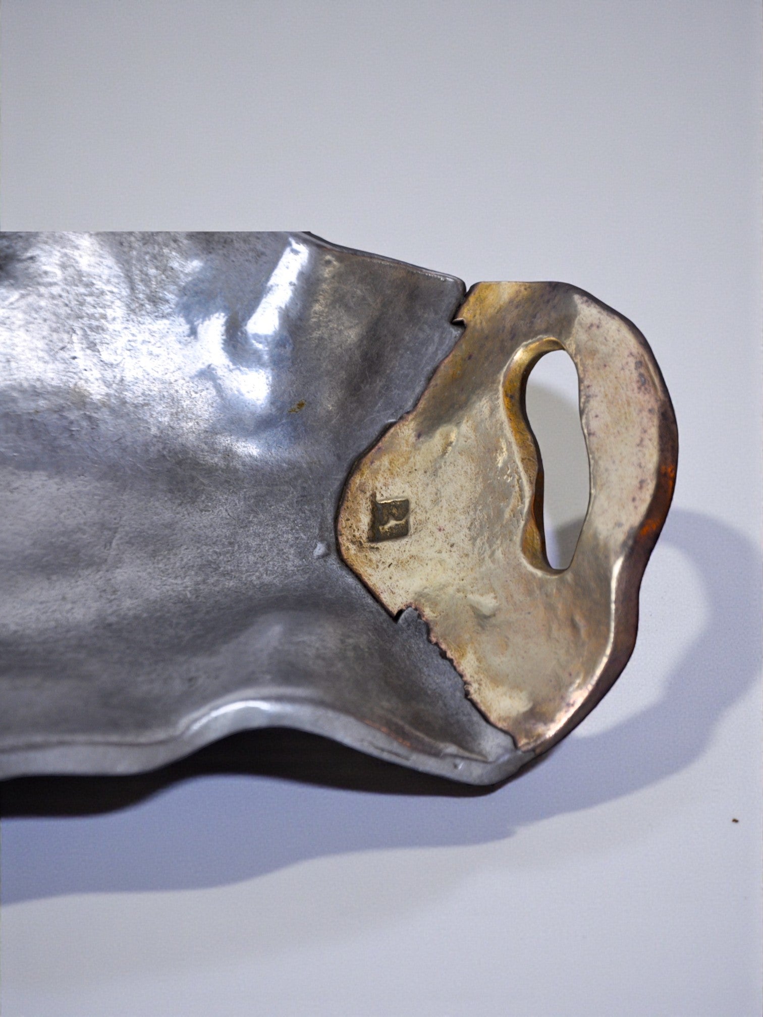 Empty Brutalist Vide-poches by Art3, 1980, Spain — side angle showing metallic surface and handle