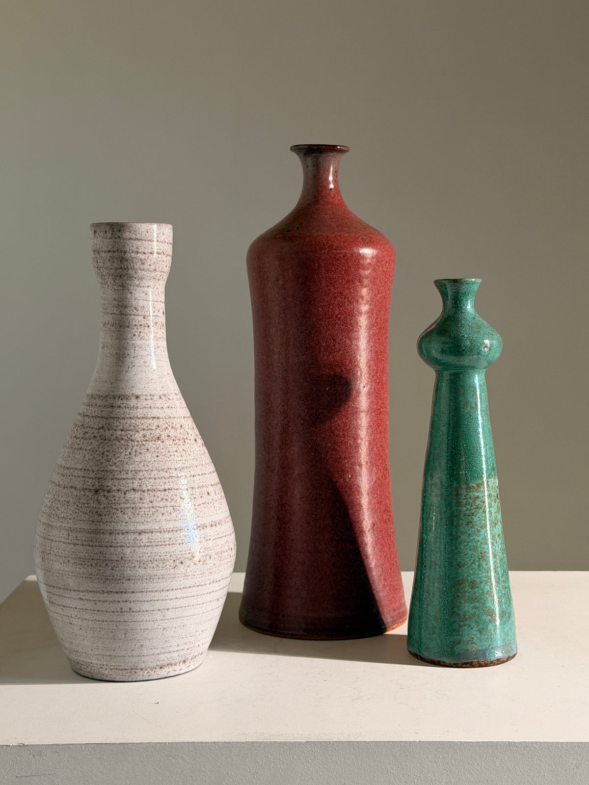 Ceramic bottle vase by Grandjean-Jourdan, circa 1960 — lifestyle setting