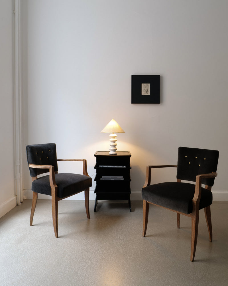French 1930s bridge chairs styled in minimalist interior setting