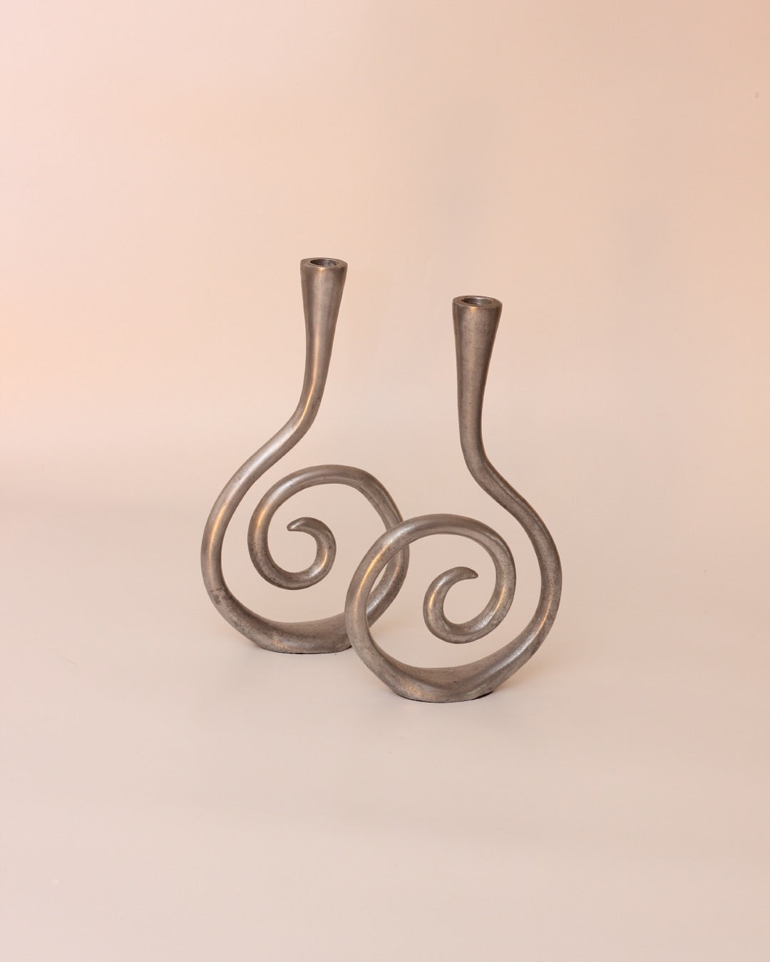 Candelabros Estaño — top view of handcrafted metal candle holders