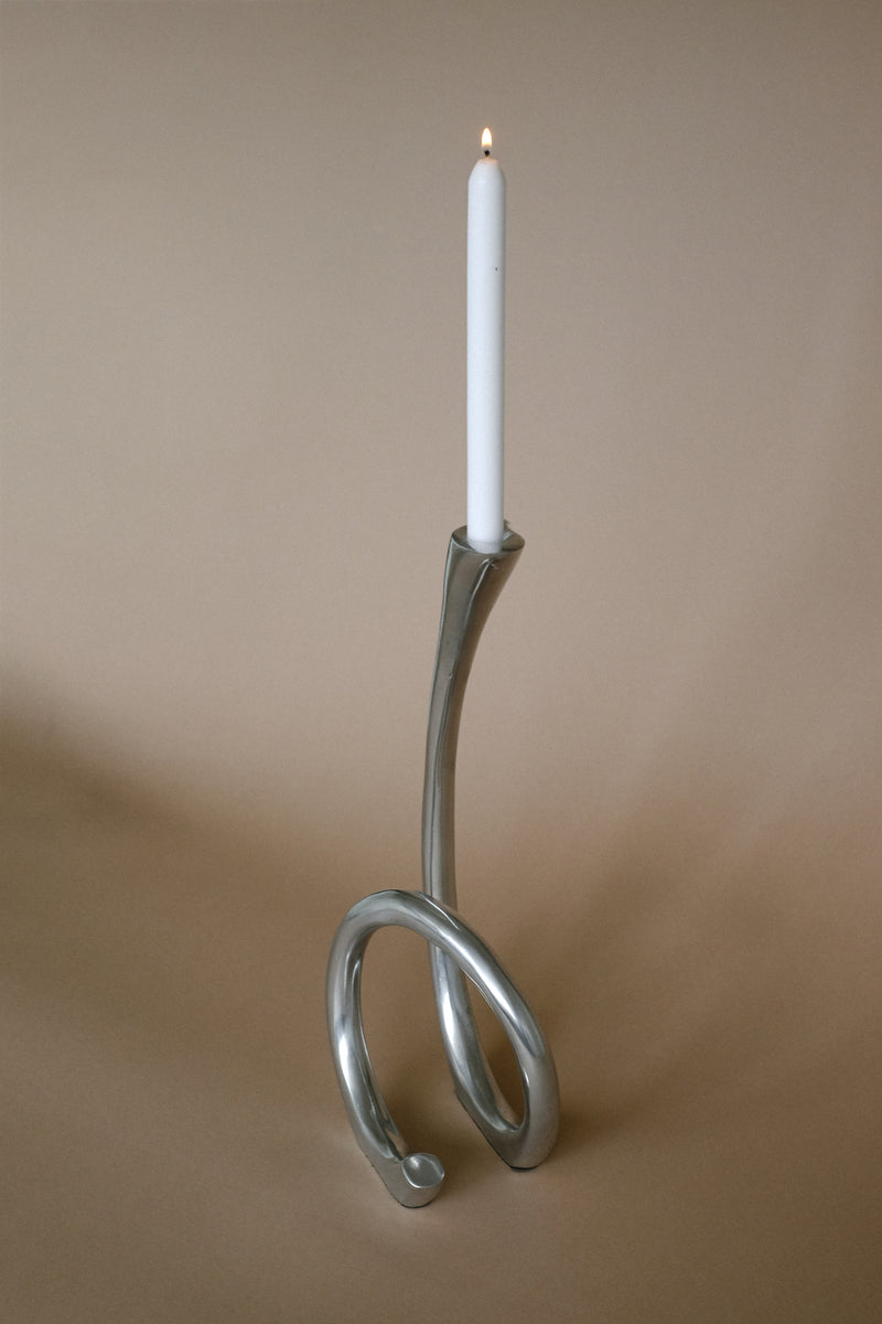 Large vintage silver candleholder with curved twisted base design