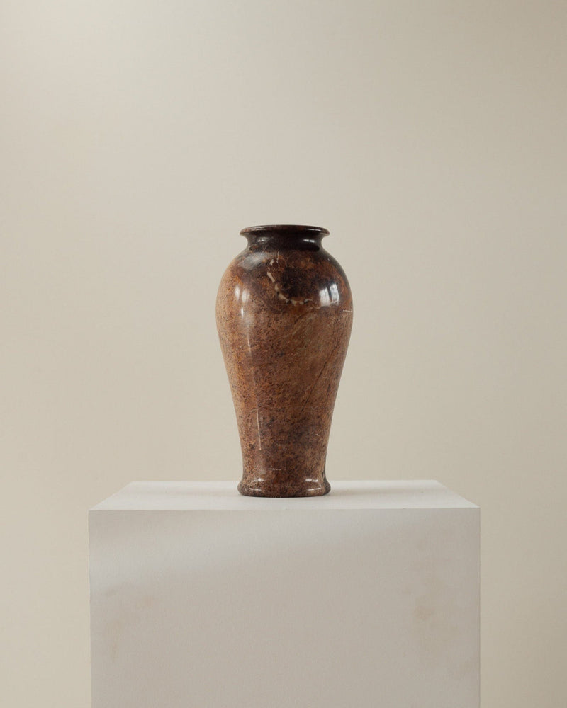 Brown marble vase with glossy finish and classic urn silhouette