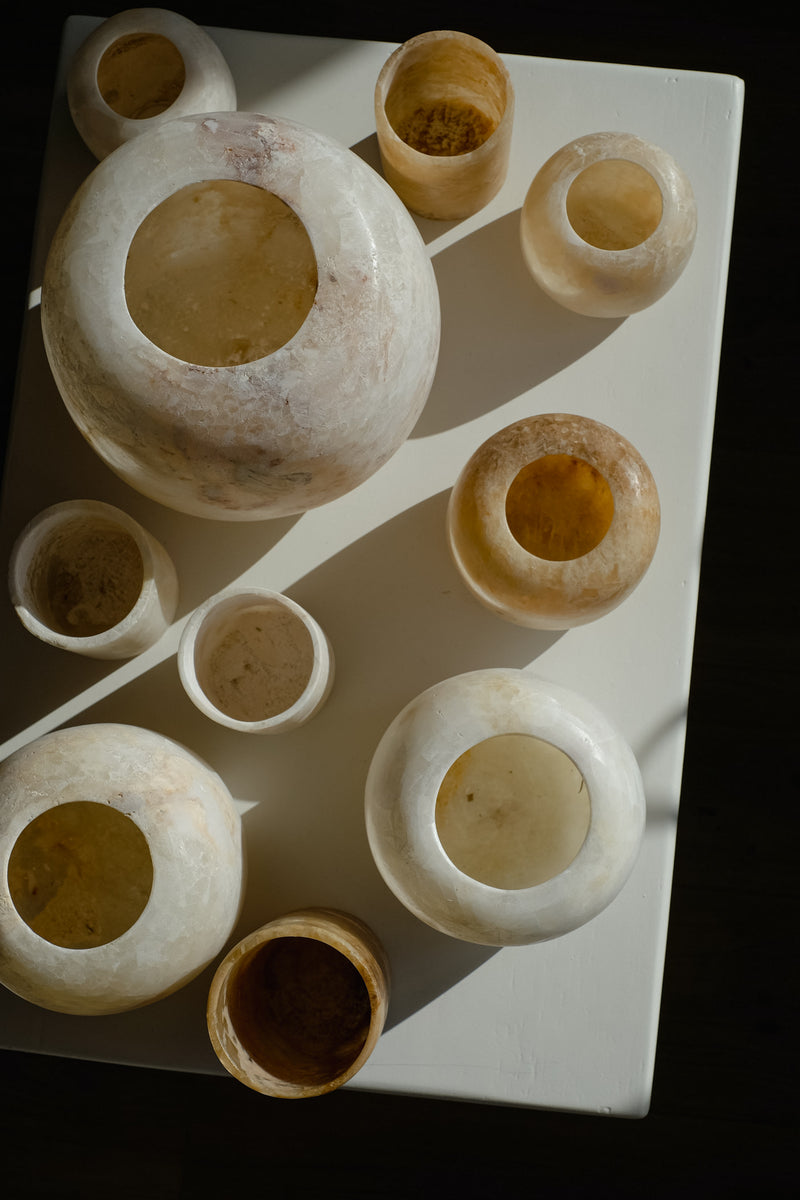 Alabaster Candle Holder — top view of various sizes on white surface