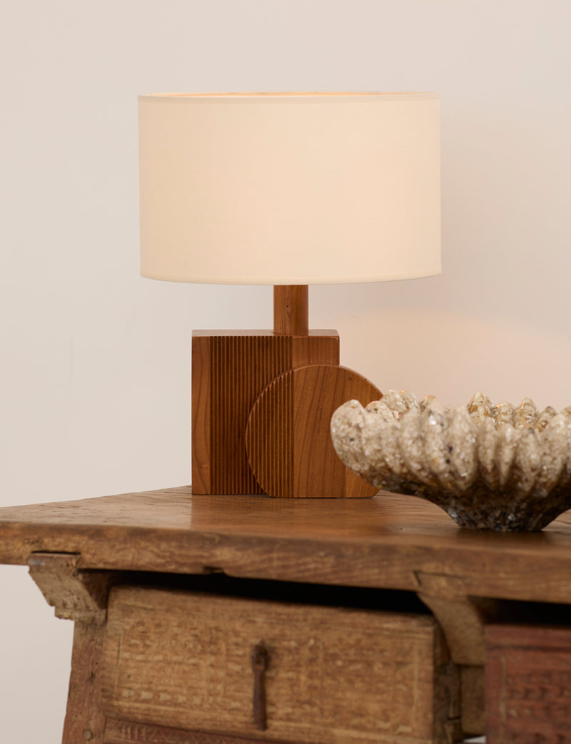 Set of 2 Vintage Artisanal Table Lamps In Solid Wood From France c. 1970 — close-up of wooden base with circular detail