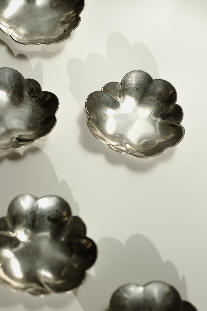 Set of 6 Small Dishes — top view of silver metal dishes