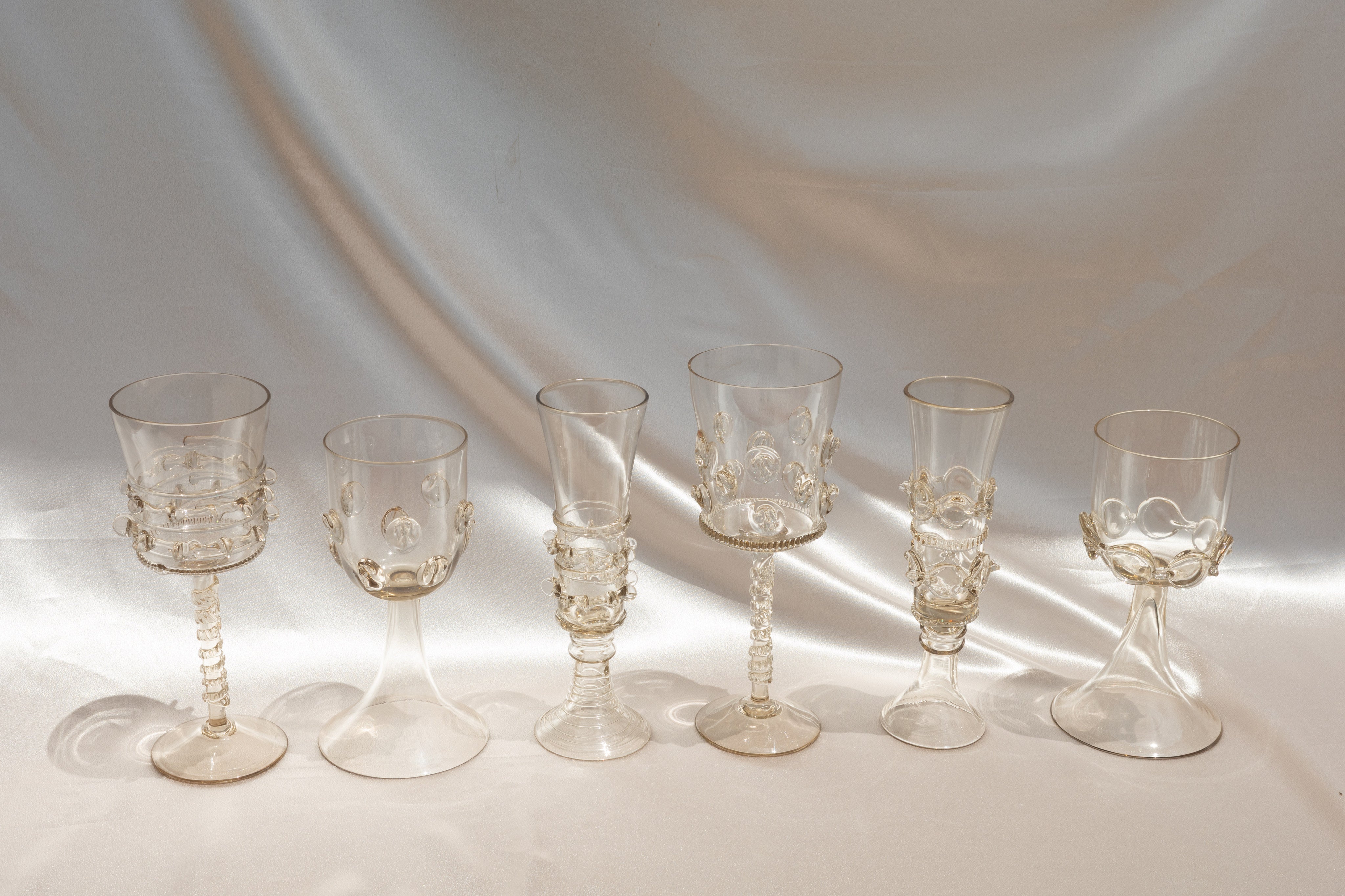 Set of six Mouthblown Wine Glasses — close-up of clear glass with intricate designs