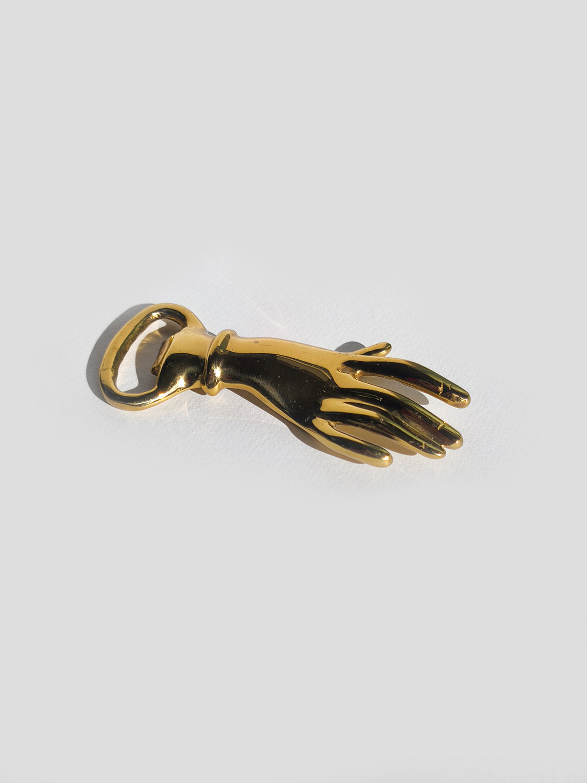 Brass Hand Bottle Opener by Les Objoies | The Oblist