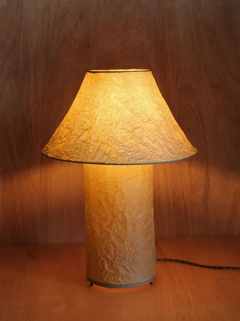 Lugh' Table Lamp - Oak — close-up of textured paper shade illuminated