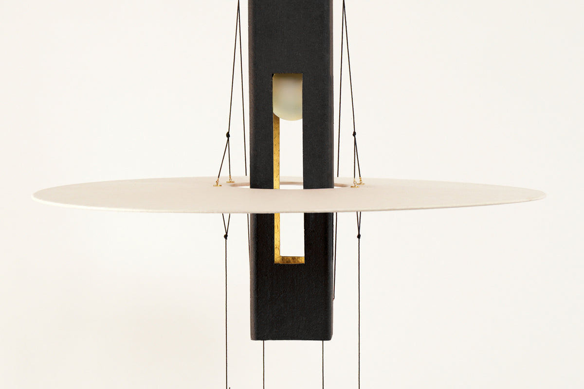 Nova Pendant Light - Black terracotta & Gold. — side angle