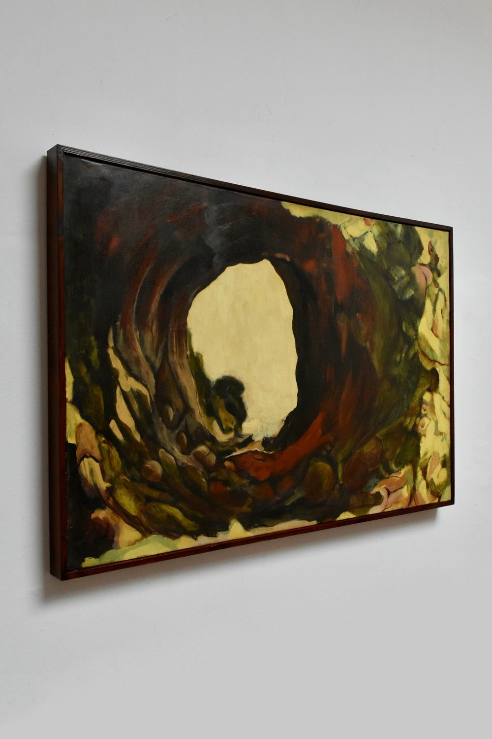 The Barracuda Interiors "Oil on Canvas Composition Painting" by Ja Janczuk (1970s) features abstract earthy swirls in browns, greens, and yellows around a bright center, framed and displayed against a white wall.