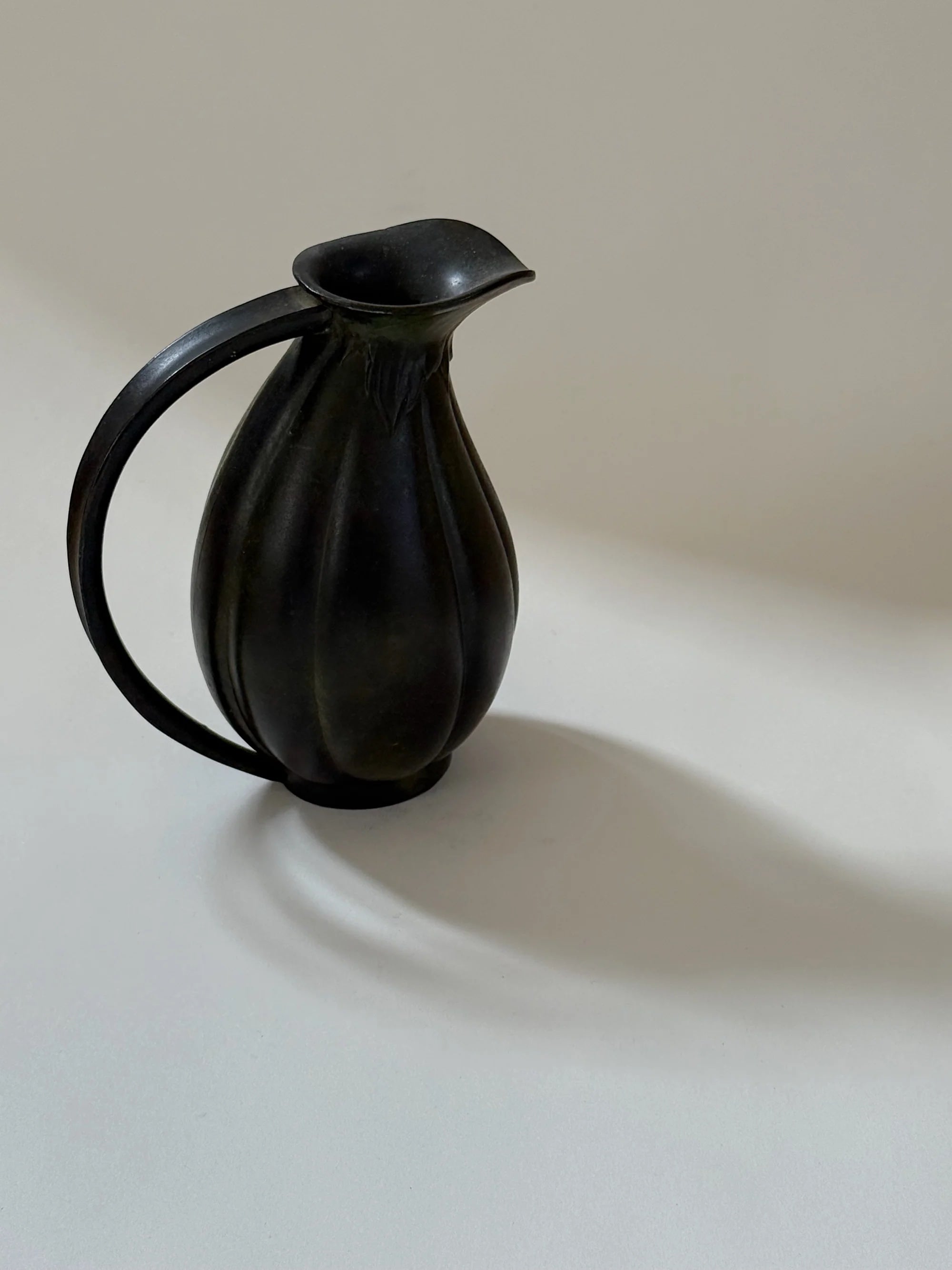 Danish Bronze Vase with Ribbed Form, 1910s — side angle showing dark bronze material
