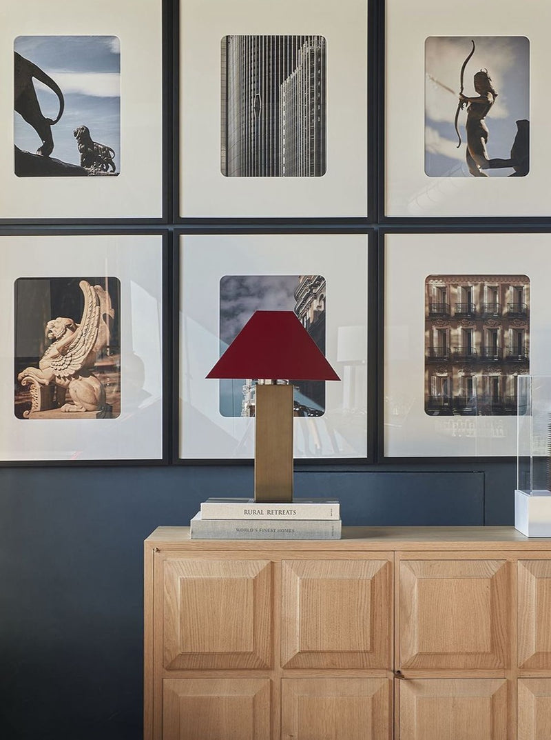 Anni Lamp — modern design with red shade on wooden sideboard
