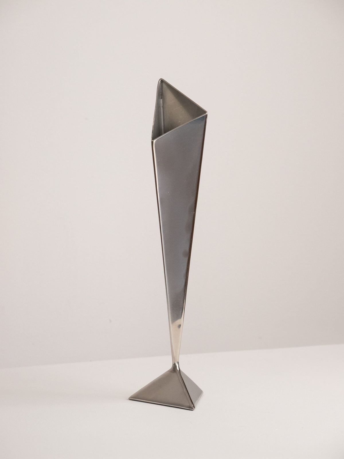 Folded Stainless Steel Bud Vase, Inverted Cone on Triangular Pyramid Foot, Space Age, 1960s-1970s — close-up