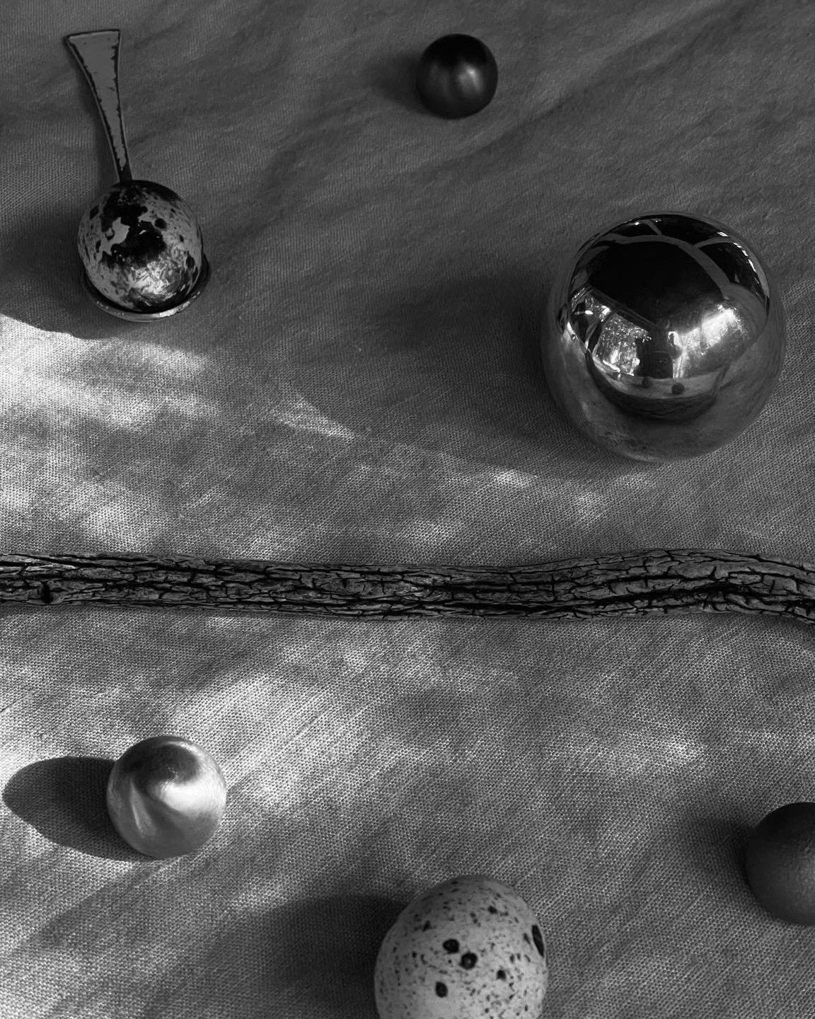 CERCLE Cabinet Knob Large — close-up of metallic knob on textured fabric
