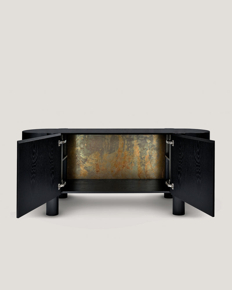 Modern black credenza with open doors revealing oxidized metal interior panel