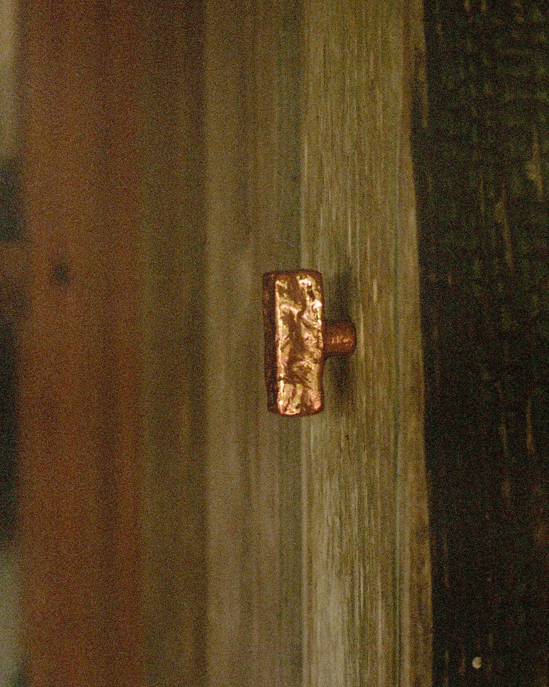ISLE Cabinet Knob/Wall Hook Medium — back view on wooden surface