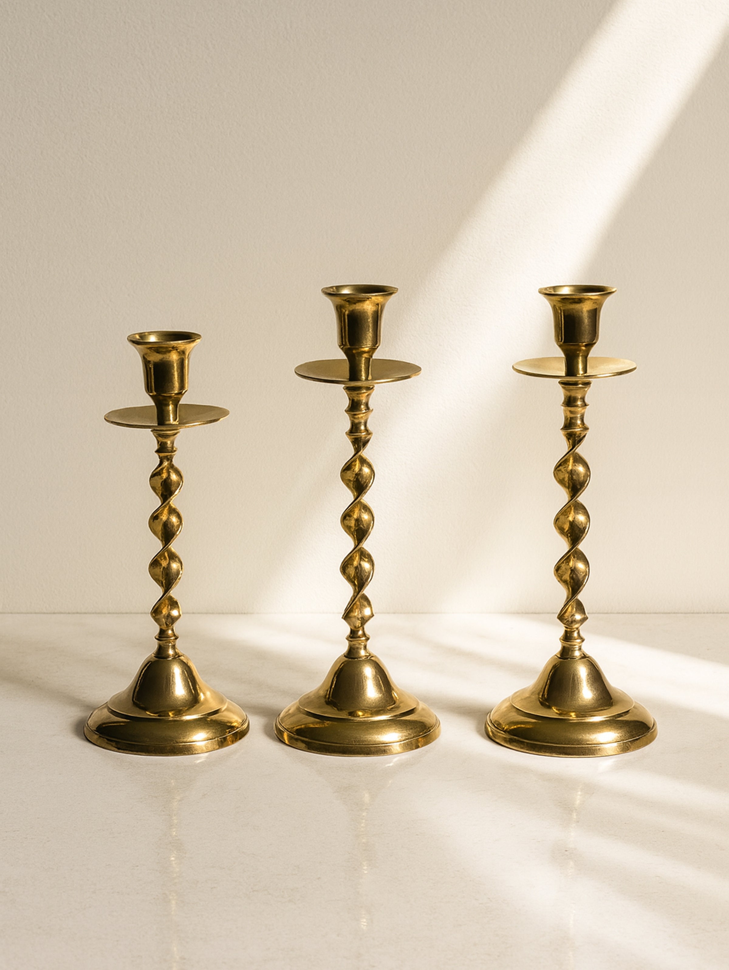 3 Candleholders Made of Polished Brass