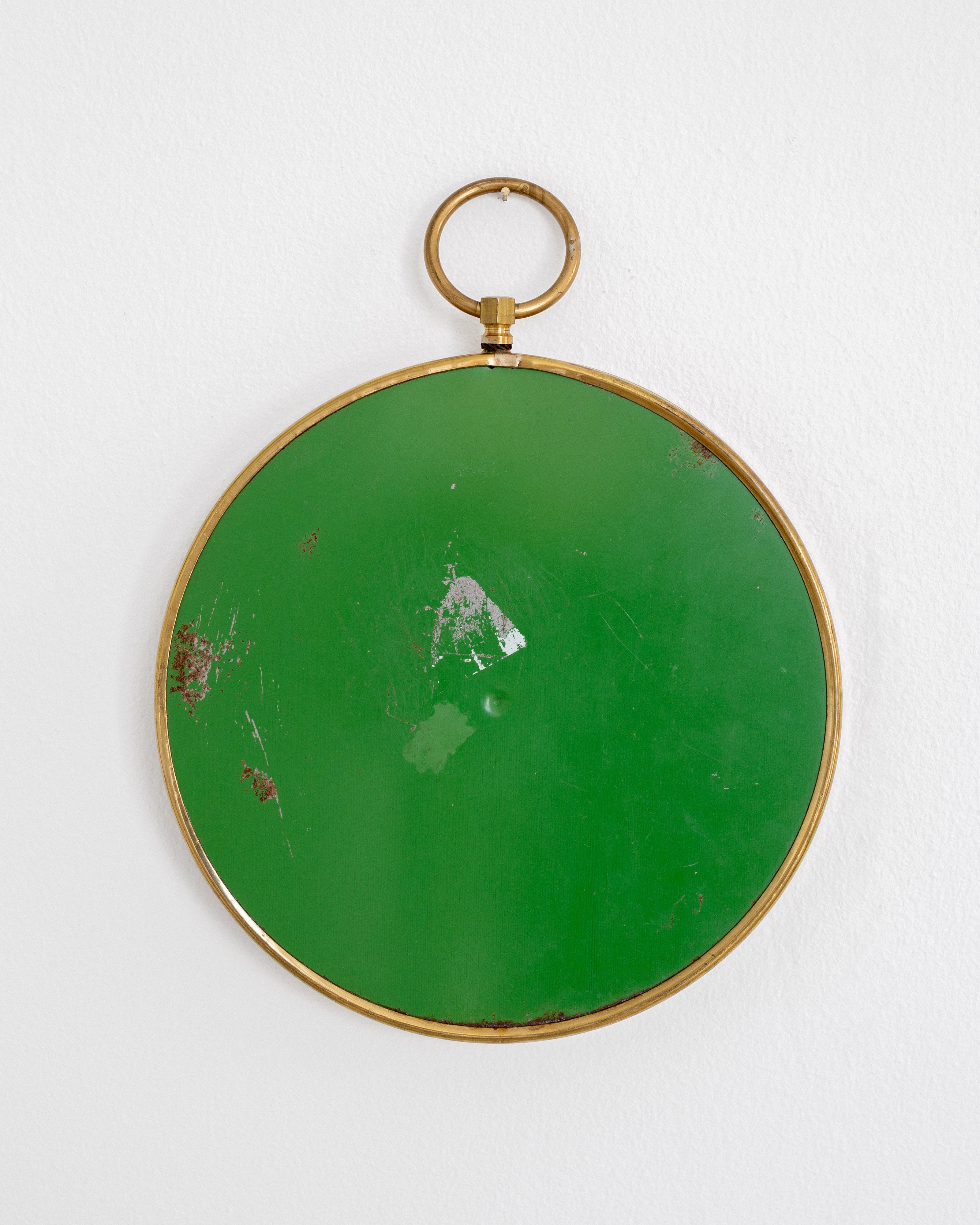 Scandinavian Mid-Century Round Brass Mirror — close-up of green back with brass frame