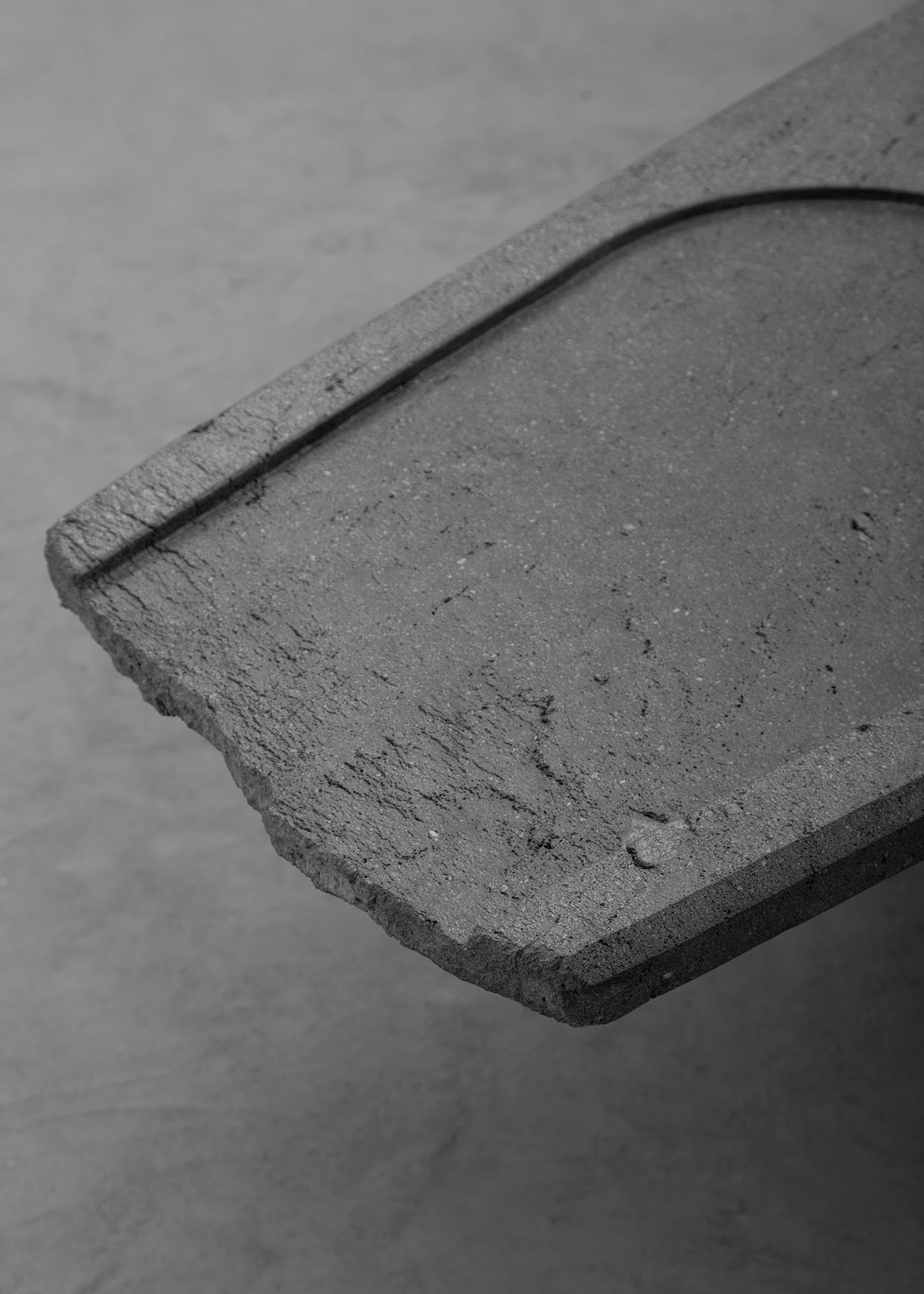 CENTRO Coffee Table Handcarved Volcanic Stone — side angle