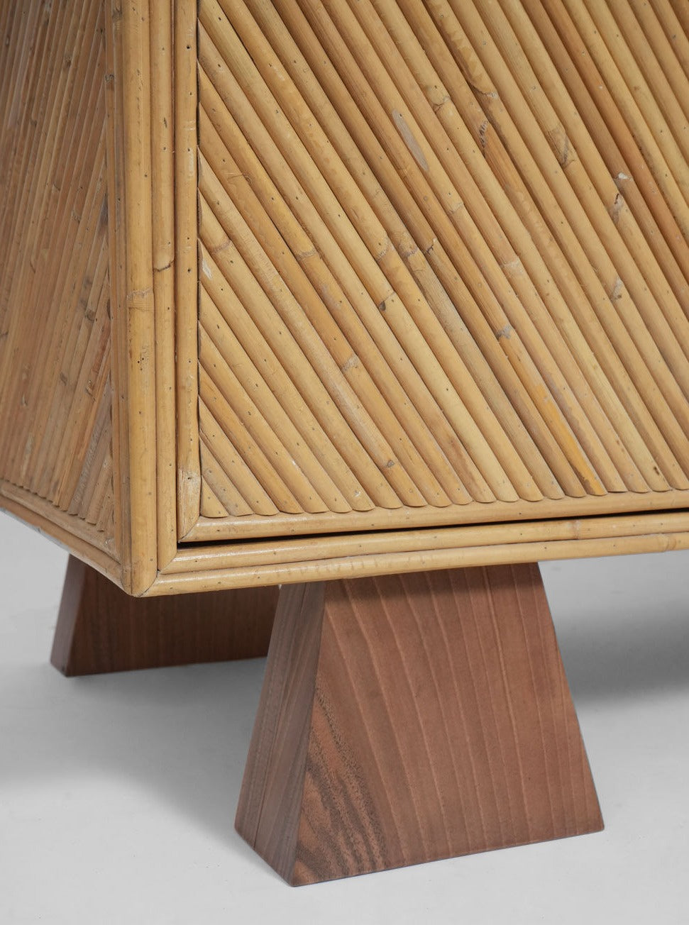 Arrabida Rattan and Walnut Sideboard — close-up of rattan texture and wooden legs