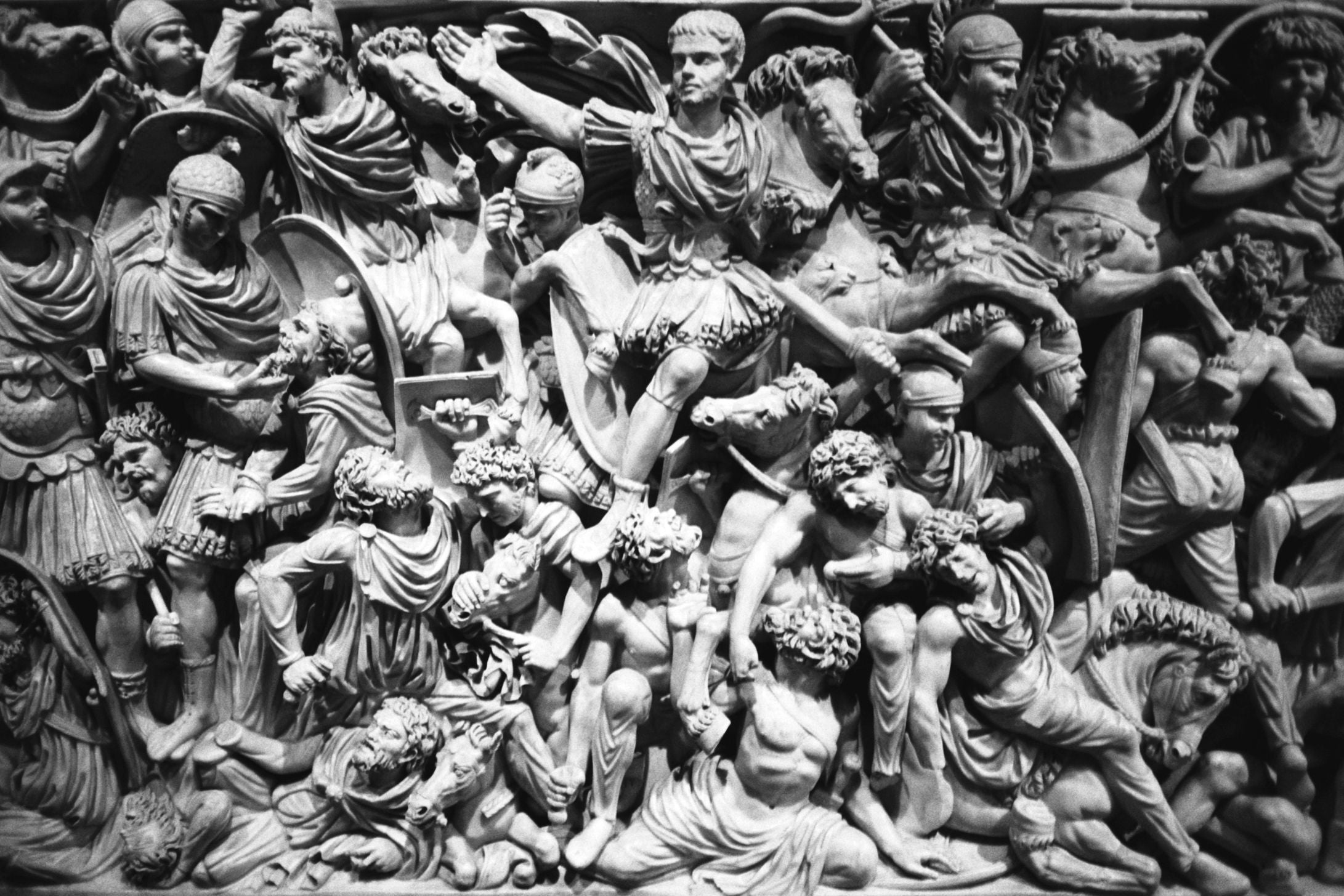 Memory #11 — Contemporary Photography by COSEINCORSO: A limited edition print in an aluminium frame captures the intense movement and emotion of armored Roman soldiers in battle, with intricately intertwined fighting figures.