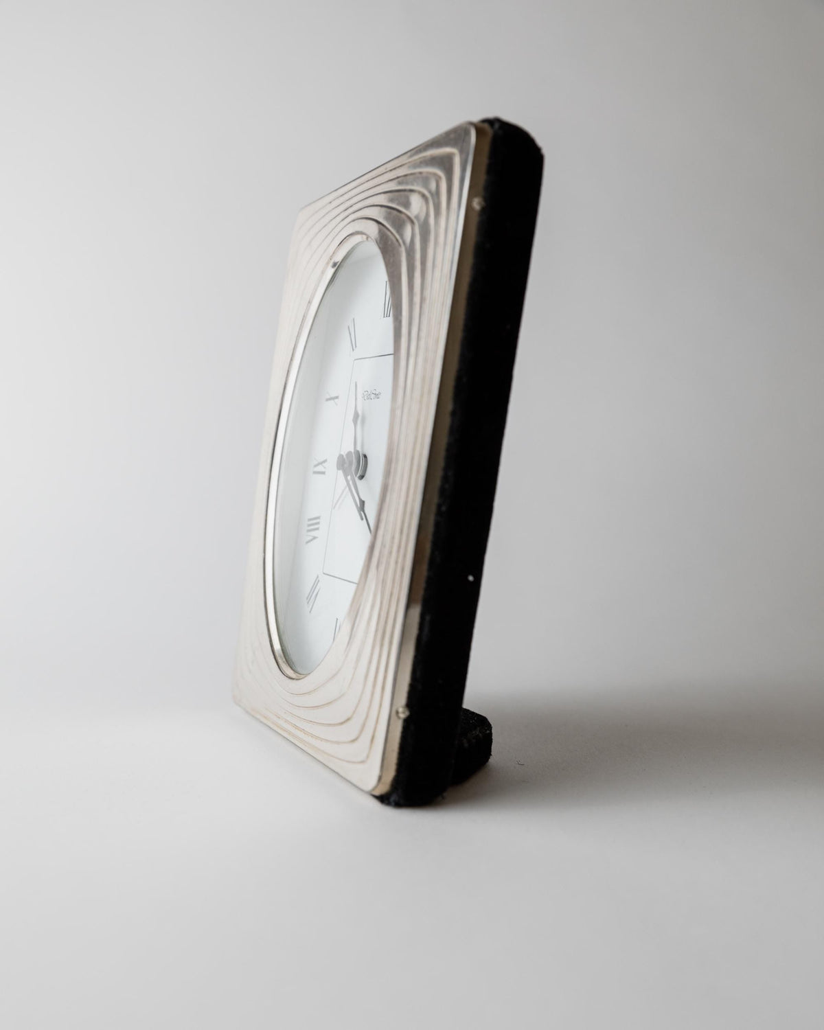 Vintage 1960s Silver Plated Desk Clock by Del Conte Italy, Rectangular Case with Oval Clock Face, Mid Century Design, Elegant Gift Idea — lifestyle setting