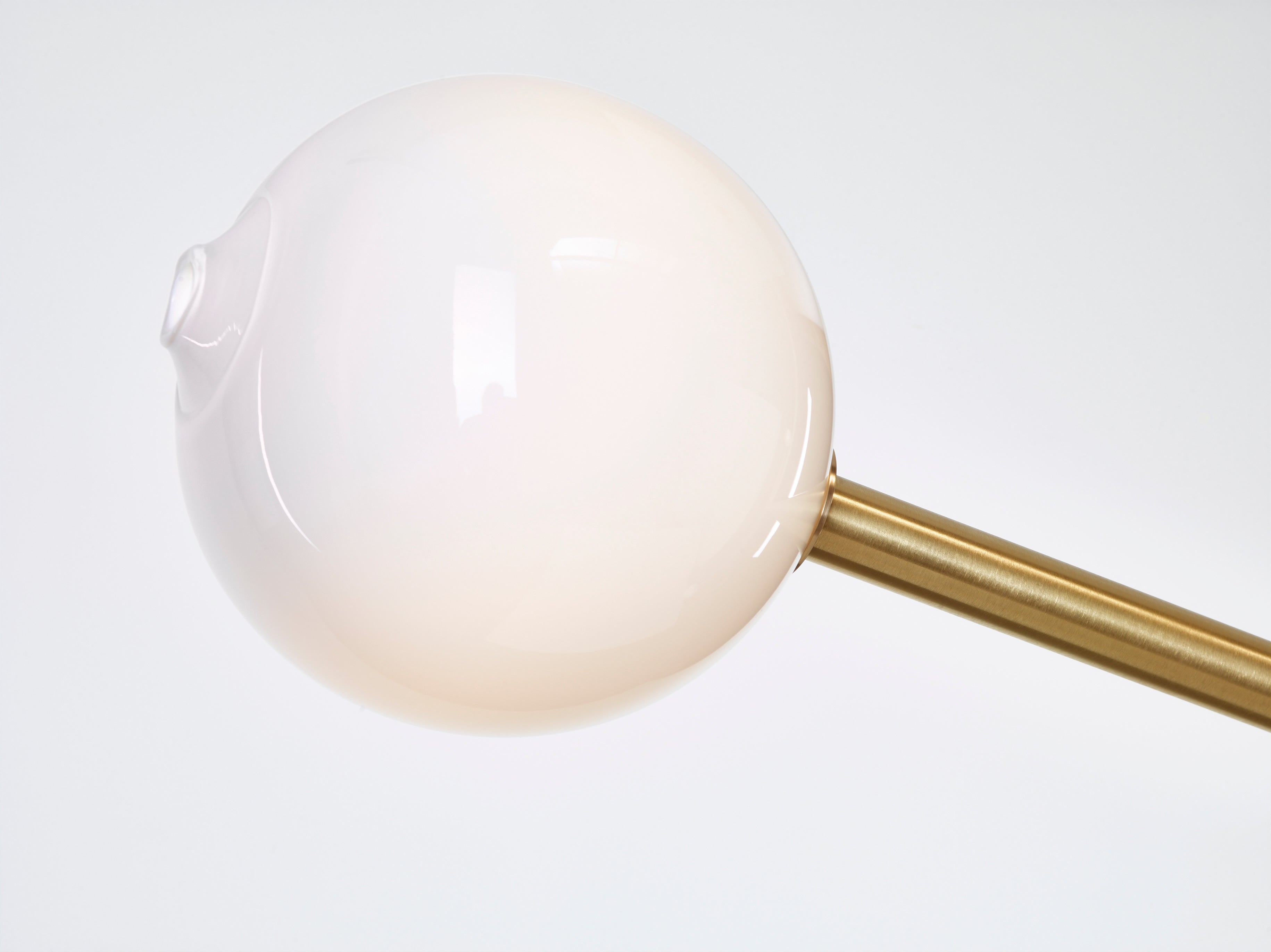 SkLO Angle 3.0 Pendant - White glass, Brushed Brass finish — side angle