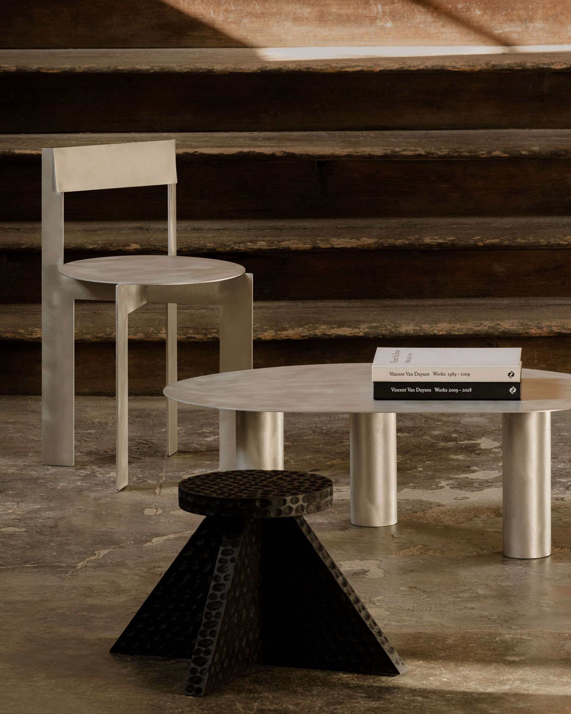 Aluminum Chair Object111 — side angle view in industrial setting