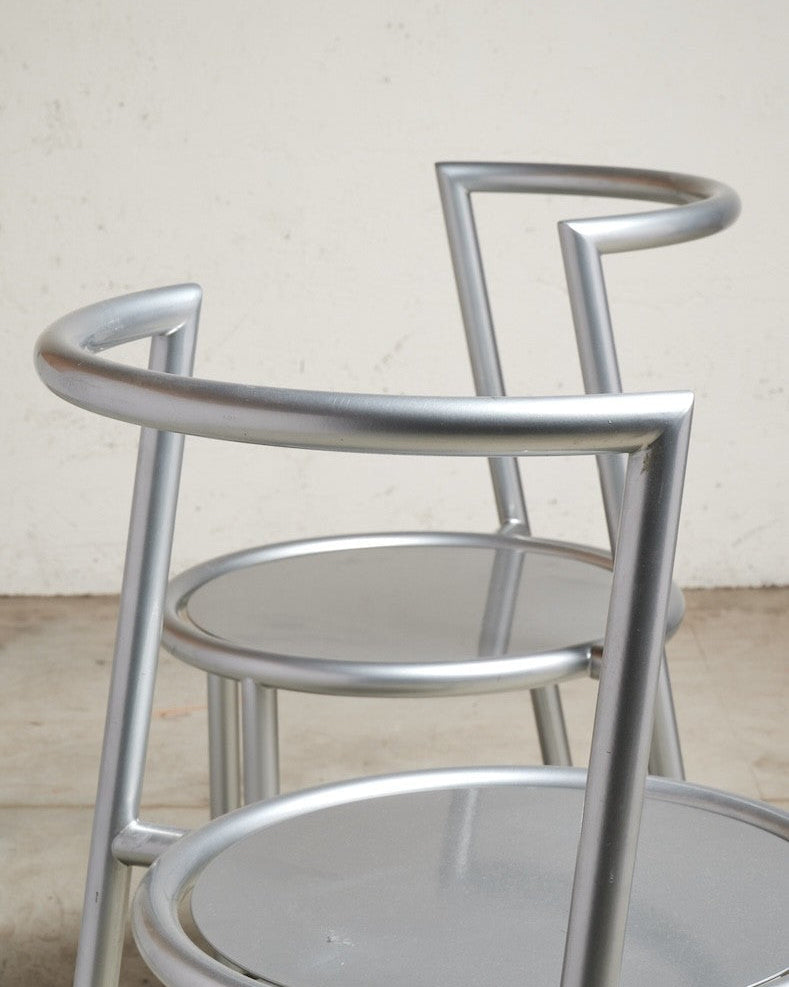 Pair of Metallo Chairs by Sergio Calatroni — side angle showing silver metal frame