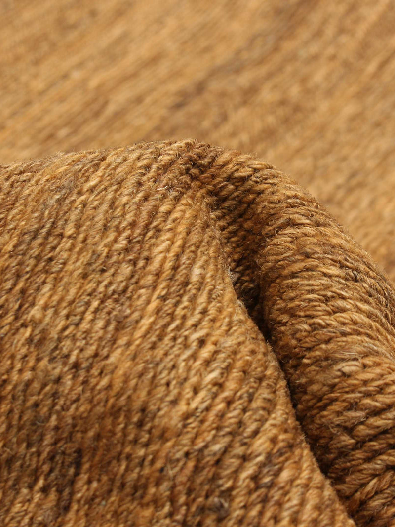 Flatweave Rug in Brick 173 x 240 cm — close-up of textured woven fabric