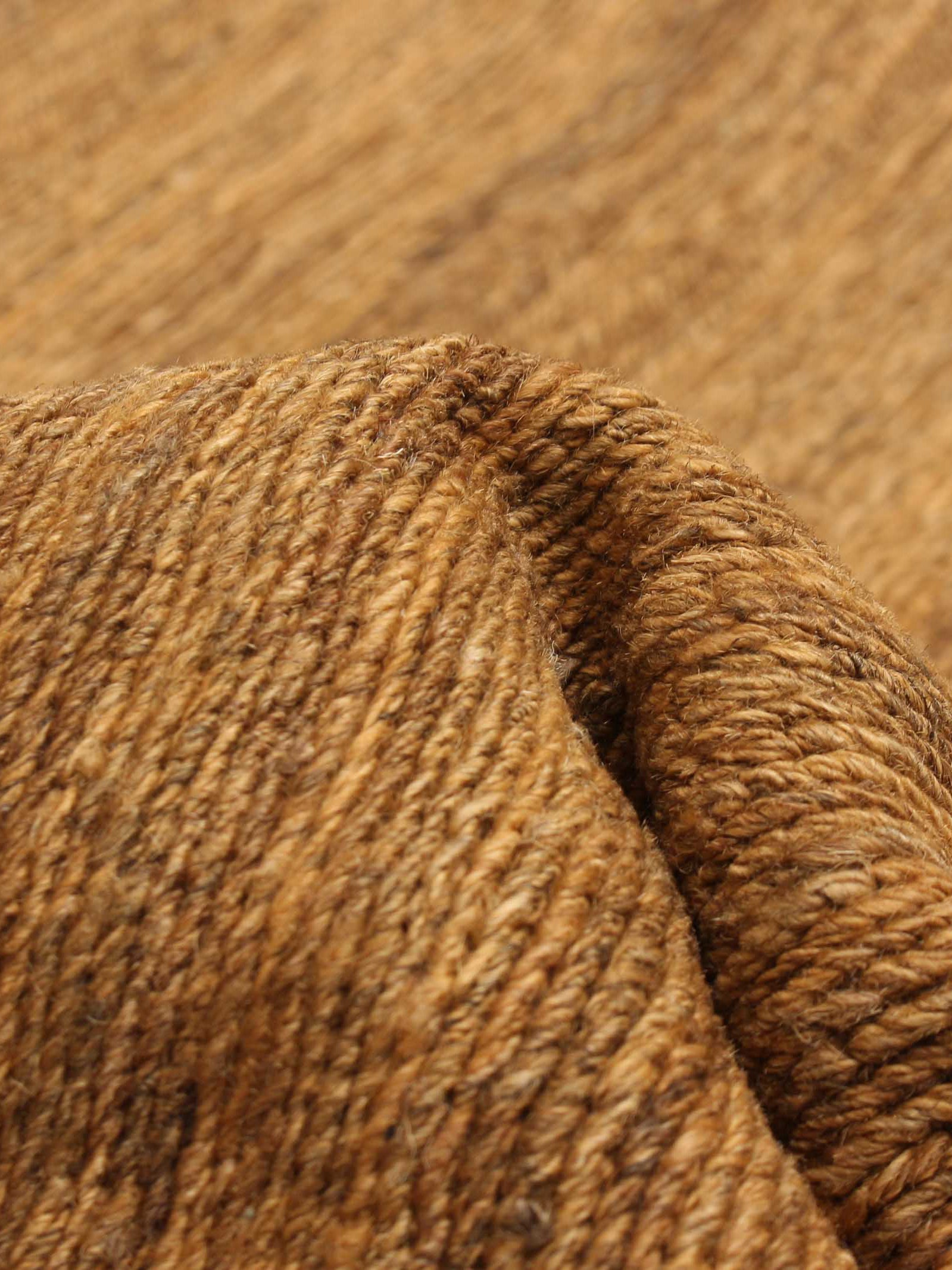 Flatweave Rug in Brick 173 x 240 cm — close-up of textured woven fabric