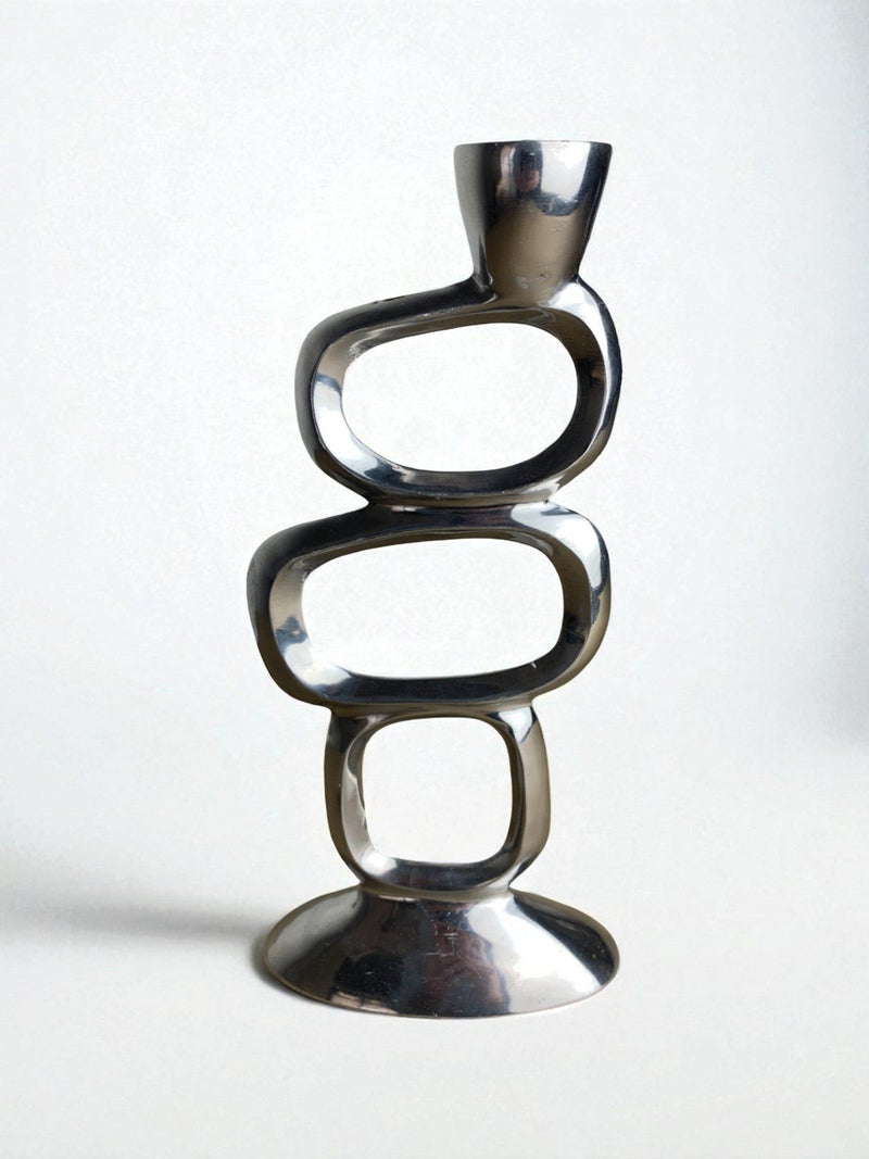 Circle Candleholder by Matthew Hilton, Aluminium, 1980s — close-up of polished aluminium surface