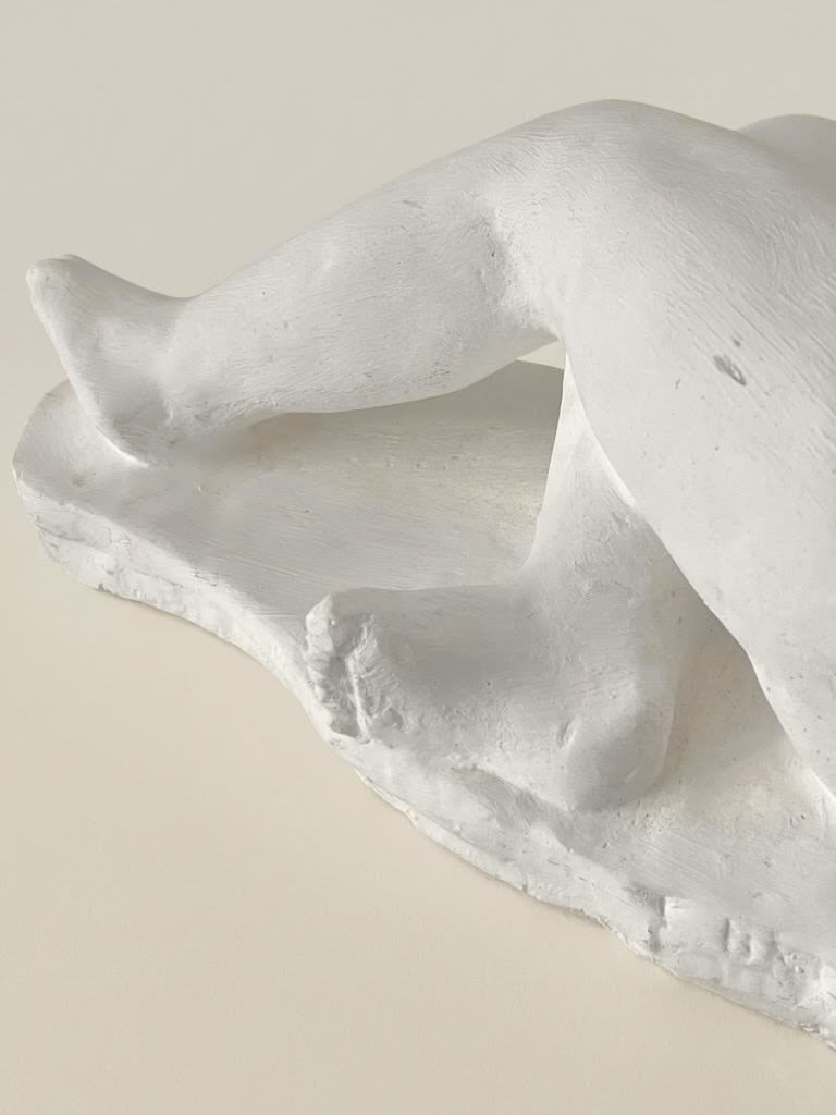 Reclining Nude, Sculpture in Plaster — back view highlighting white plaster texture