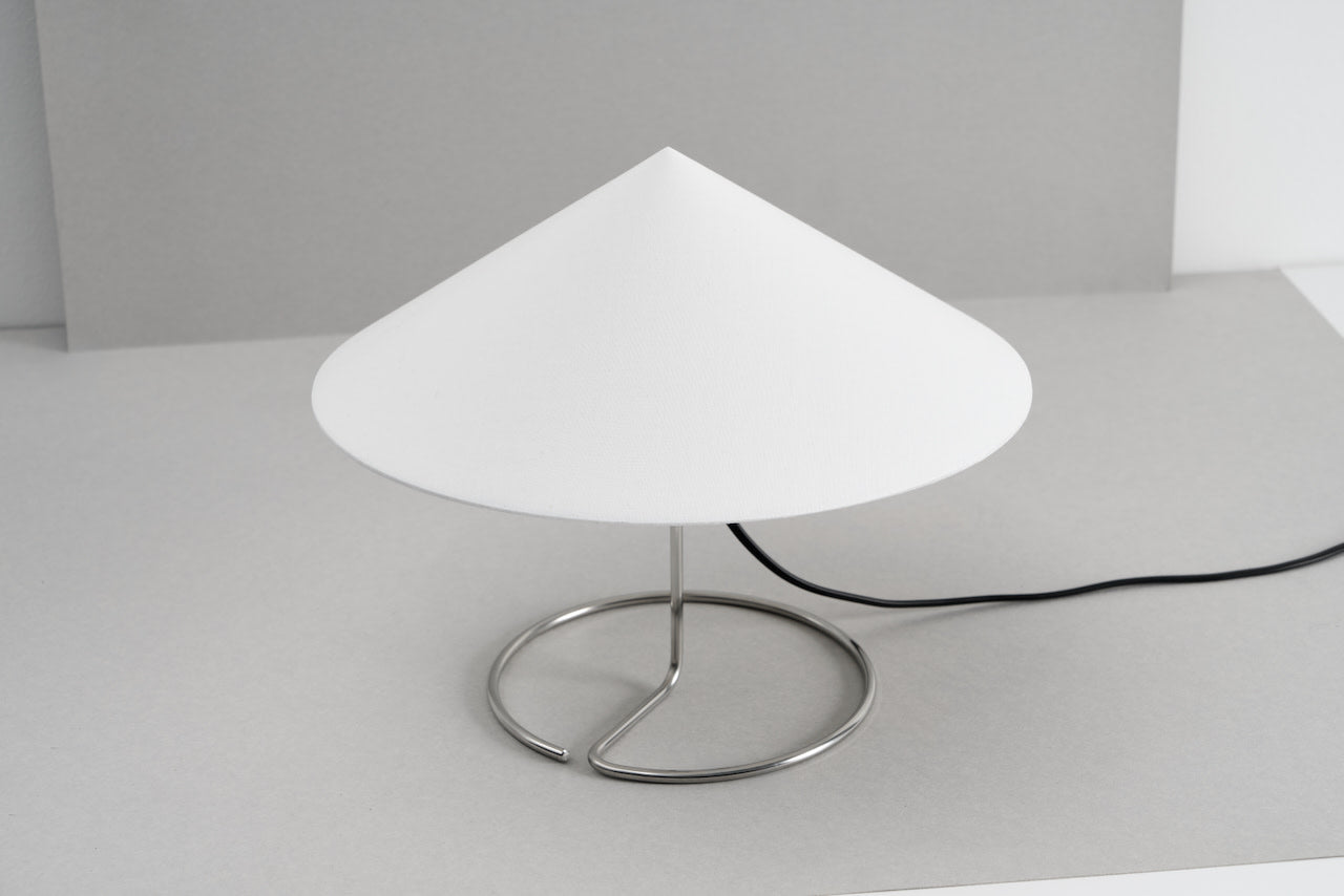 Douli Table Lamp — top view of white fabric shade and metal base