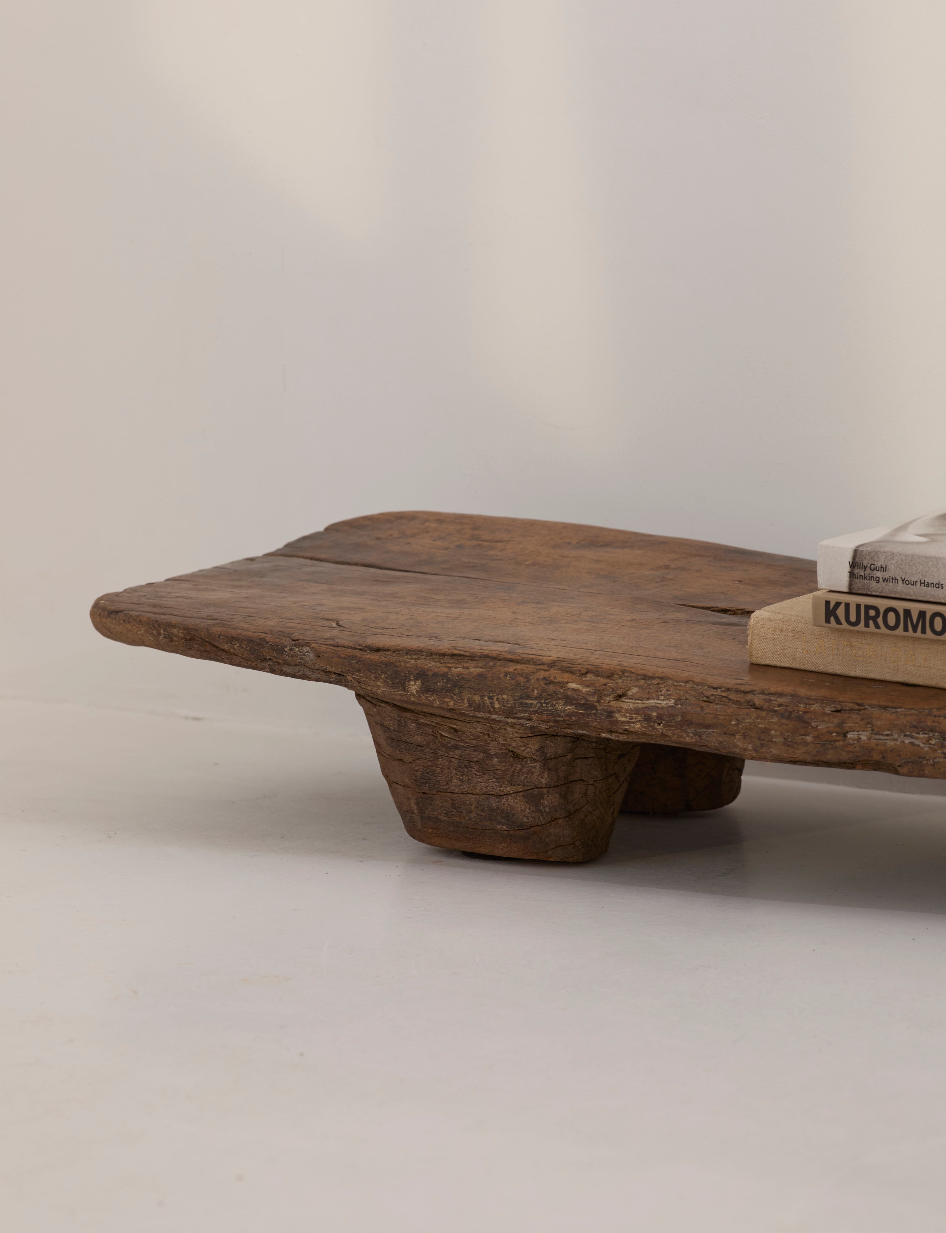 Carved Senufo Bench in Wood — top view of rustic wooden seat