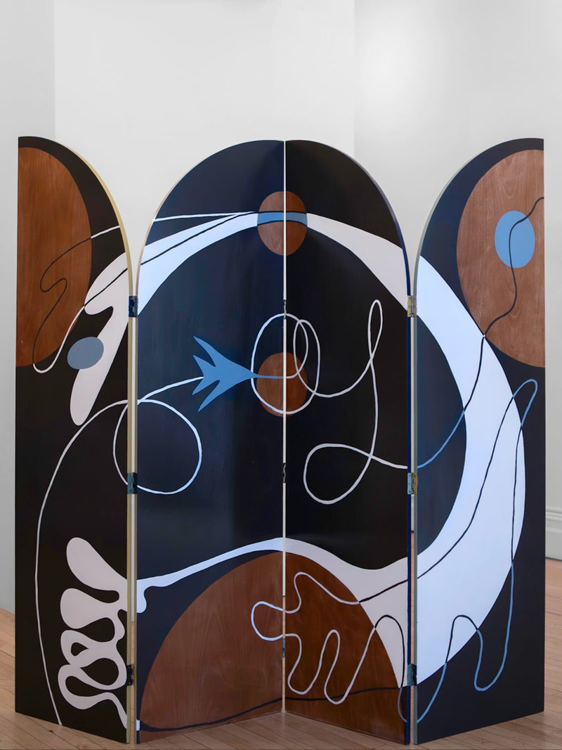 Circular Motion Screen — close-up of painted wood panels in modern setting