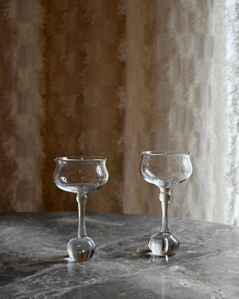 EDEN Wine Glass - Set of 2 — close-up on marble table with textured glass